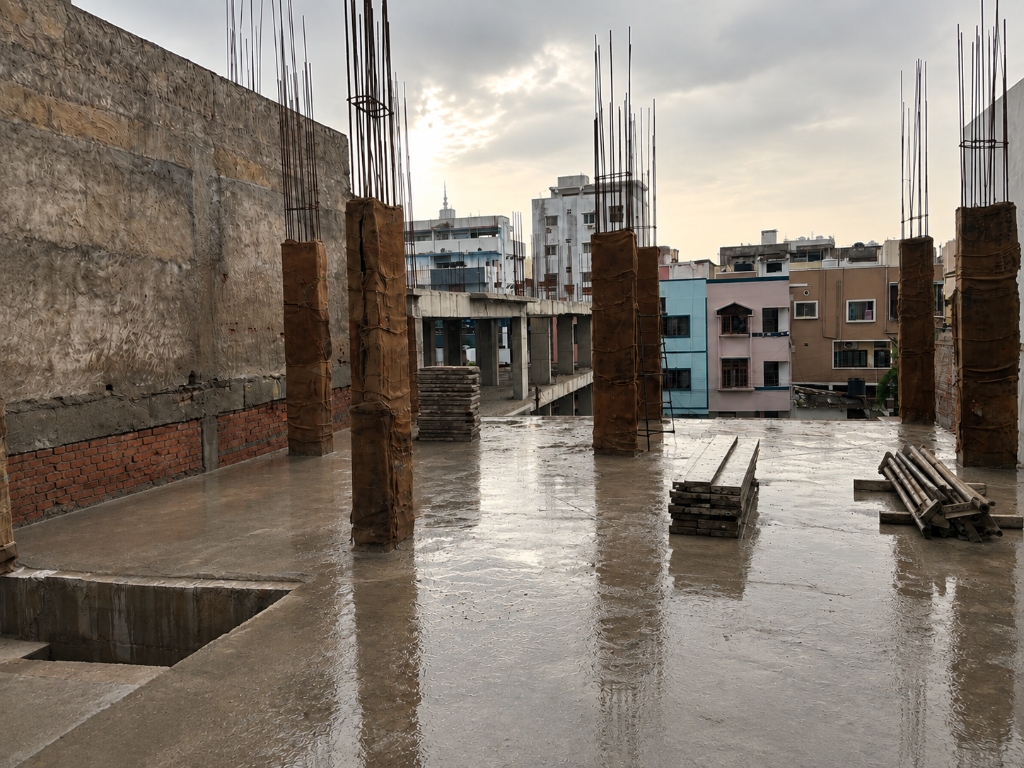 Project engineer planning milestones on active construction site
